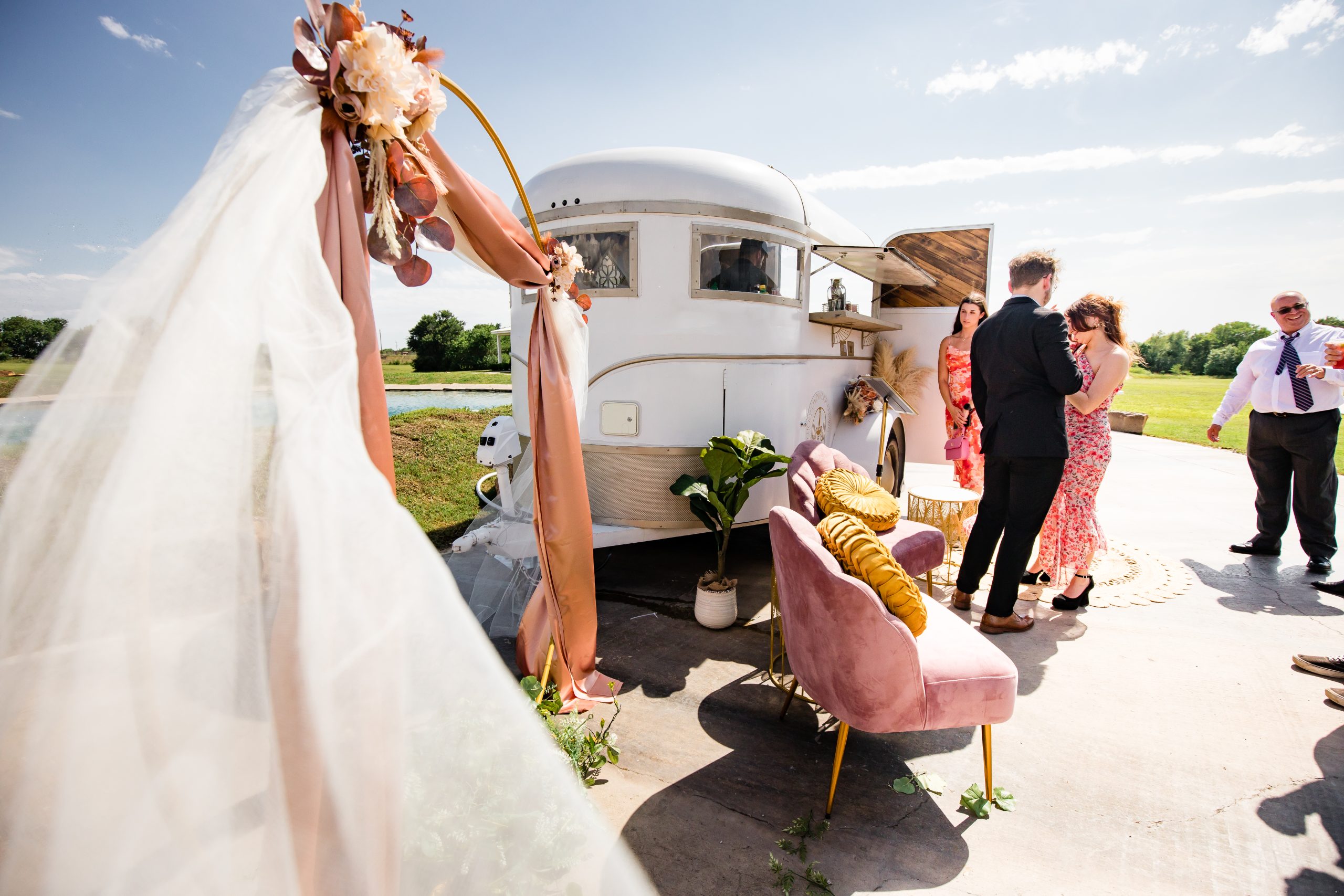 A styled mobile bar trailer at a North Texas wedding